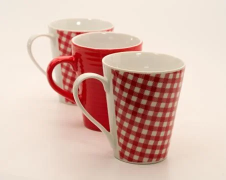 Set of three mugs Stock Photos