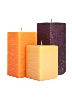 Set of three square candles isolated on white Stock Photos