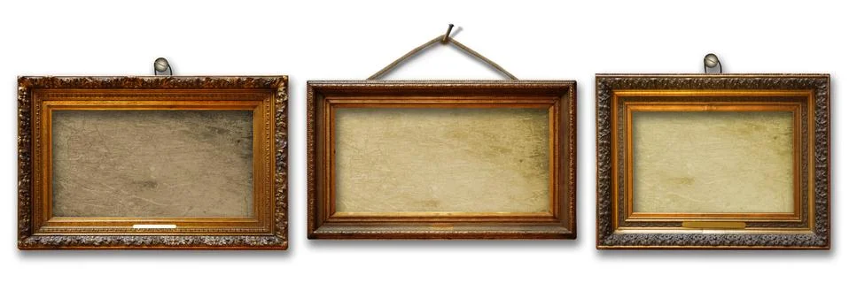 Set of three vintage golden baroque wooden frames on  isolated background Stock Photos