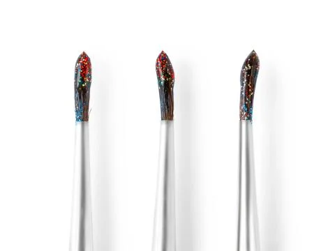 Set of three wet brushes with colored glitters Stock-Fotos