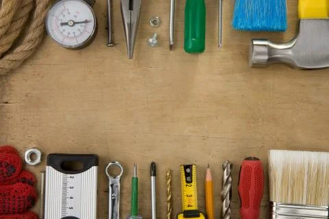 Set of tools and instruments on wood texture Stock Photos