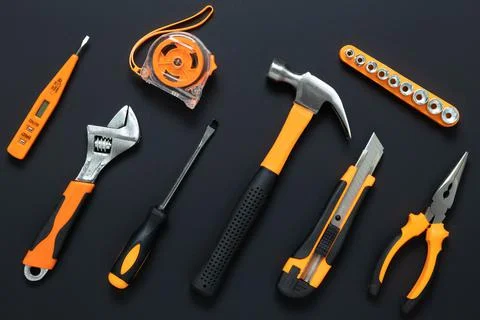 Set of tools on black background. Construction, DIY concept. Equipment,  work Stock Photos