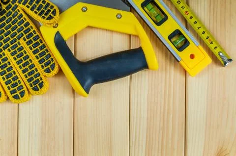 Set of tools for the Builder on a wooden background with a place for advertis Stock Photos