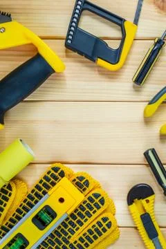 Set of tools for the Builder on a wooden background with a place for advertis Stock Photos