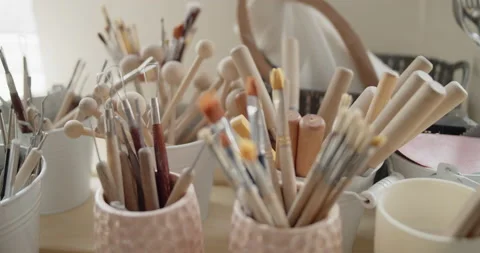 Set of tools for crafting, texturizing or sculpting clay in pottery workshop Video stock 154356734