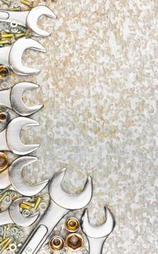 Set of tools framing a textured background Stock Photos