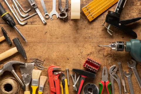 Set of tools. Hand tools for craftsmen on old table. Stock Photos