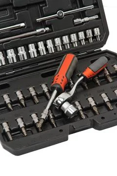 Set of tools in an open, special, plastic case on a white background Stock Photos
