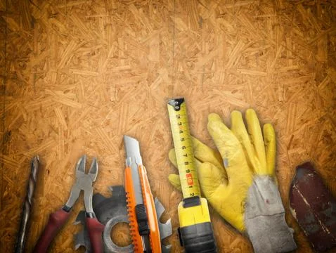 Set of tools over a wood panel Stock Photos
