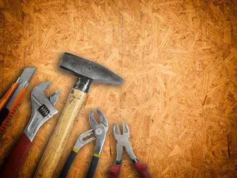 Set of tools over a wood panel Stock Photos