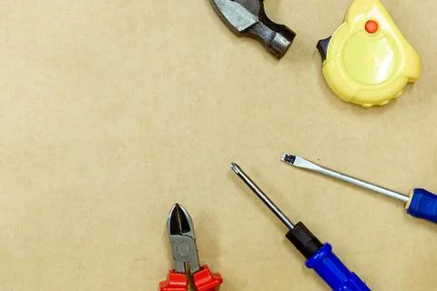 Set tools pattern construction pair screwdrivers hammer centimeter tape close Stock Photos