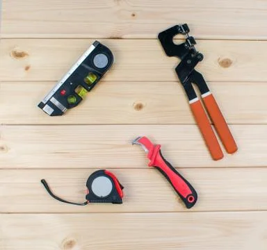 Set of tools for repai and carpentry. Knife, key, roulette and level. Top vie Stock Photos