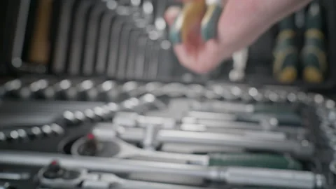 From the set of tools, they take pliers in your hand for repair, a necessary and 動画素材 265029788