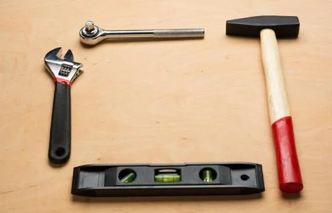 Set of tools on a wood panel Foto stock