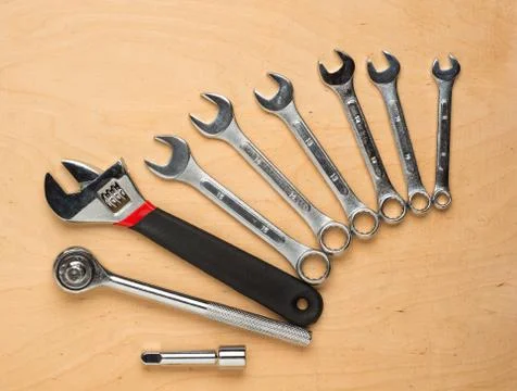 Set of tools on a wood panel 写真素材