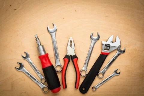 Set of tools on a wood panel Foto stock