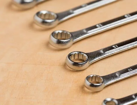 Set of tools on a wood panel Foto stock