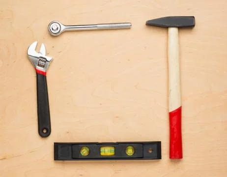 Set of tools on a wood panel Foto stock