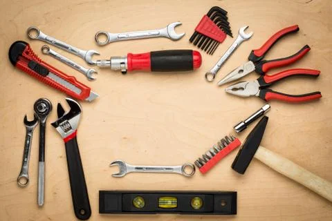 Set of tools on a wood panel 写真素材