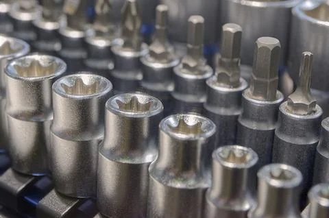 Set of torx, hex and phillips screwdriver heads and sockets of different si.. Stock Photos