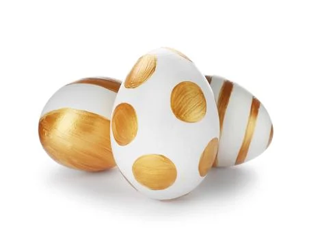 Set of traditional Easter eggs decorated with golden paint on white backgroun Stock Photos