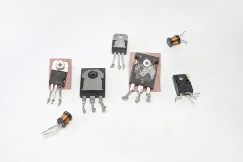 Set of transistors and high-frequency inductance coil. Electronics parts Stock Photos