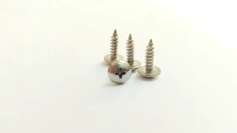 A set of truss head screws on a white background Stock Footage 314929657