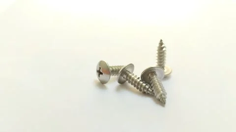 A set of truss head screws on a white background 스톡 동영상 314929704