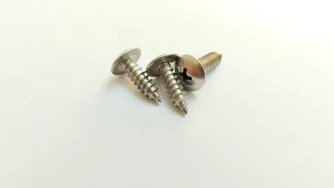 A set of truss head screws on a white background 스톡 동영상 314929819