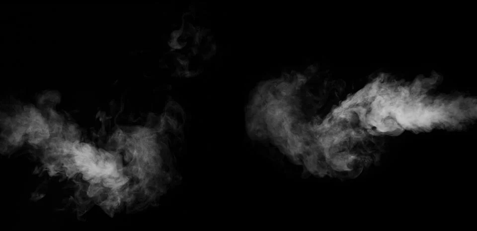 Swirling wriggling smoke steam isolated on a black background for