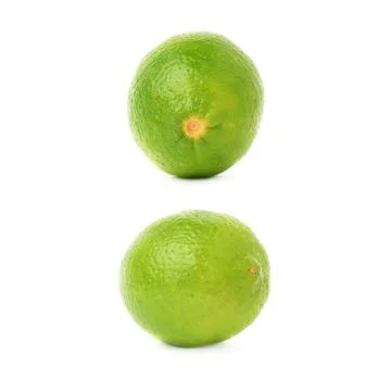 Set of two single limes in different compositions and foreshortenings, isolated Foto stock