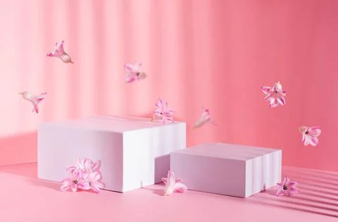 Set of two white square podiums for presentation cosmetic and produce in sunb Stock Photos