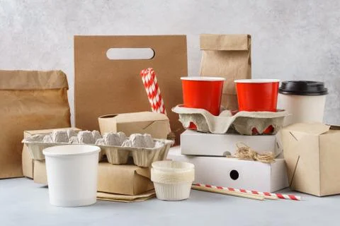 Set of various eco friendly packaging, containers and tableware. Stock Photos