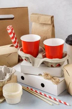 Set of various eco friendly packaging, containers and tableware. Stock Photos