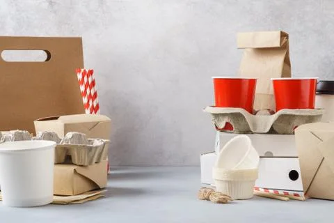 Set of various eco friendly packaging, containers and tableware. Stock Photos