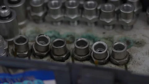 Set of various metal adapters and nozzles arranged in container. Stock Footage 343890842