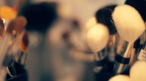 A set of various size and different color brushes for powder in the store Stock Footage 68371380