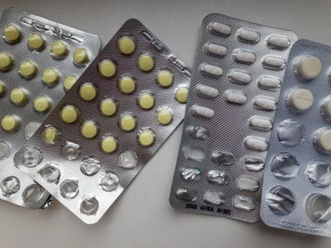 Set of various tablets in blister pack. Close up, white background Stock Photos