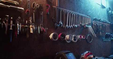 Set of various tools hanging in repair service Stock Footage 259394693