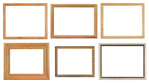 Set of various wooden picture frames with cut-out canvas, against a white Stock Photos