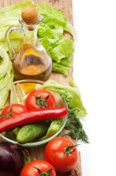 Set vegetable and jug of vegetable oil isolated Stock Photos