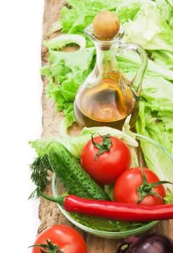 Set vegetable and jug of vegetable oil isolated Stock Photos