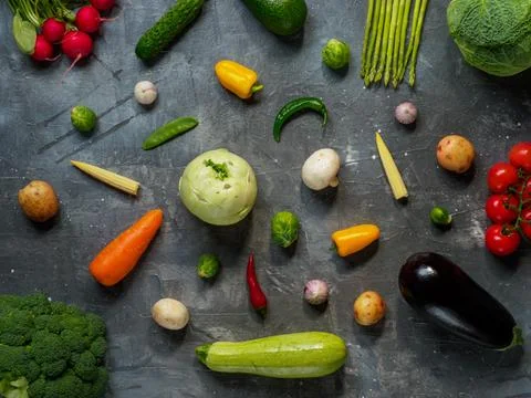 Set of vegetables on dark background. Stock Photos