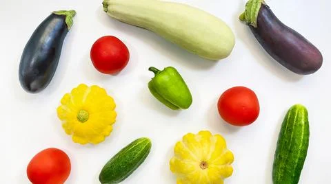 Set of vegetables isolated on a white background, eggplant, zucchini, tomatoes Stock Photos