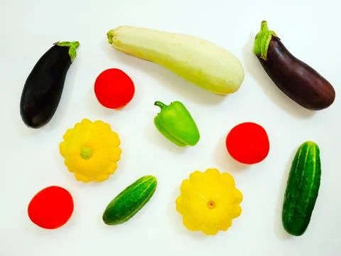 Set of vegetables isolated on a white background, eggplant, zucchini, tomatoes Stock Photos