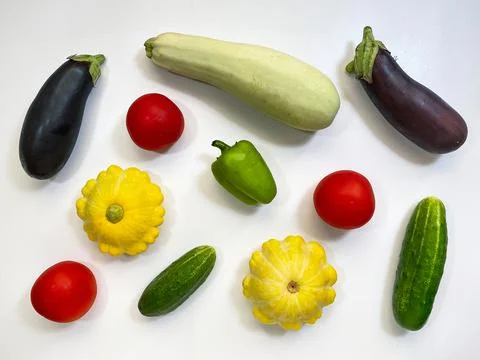 Set of vegetables isolated on a white background, eggplant, zucchini, tomatoes Stock Photos