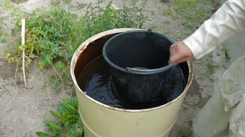 Set water bucket from the barrel 스톡 동영상 54335495