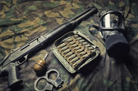 Set of weapons of a fighter of a special unit. Shotgun, ammo, grenade, hand.. Stock Photos