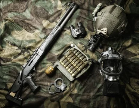 Set of weapons of a fighter of a special unit. Shotgun, ammo, grenade, hand.. Stock Photos