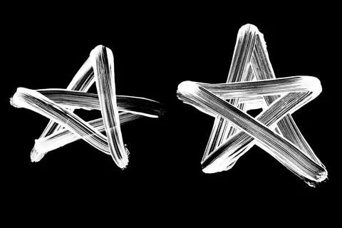 Set of White Chalk Hand Drawn Star Icons and Sparkles Illustrazione stock